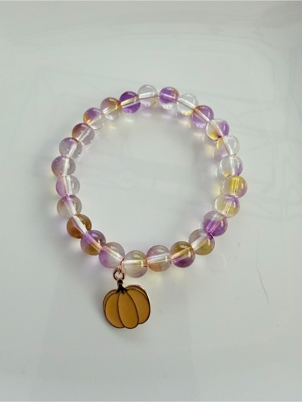 Purple and Yellow Beaded Bracelet with Pumpkin Charm